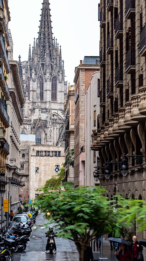 Sagrada Church at end of Barcelona wet street
