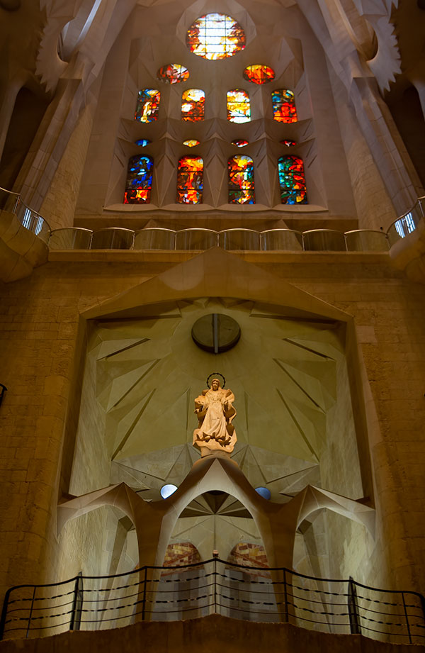 Familia Sagrada Cathedral Christ statue and stained glass windows
