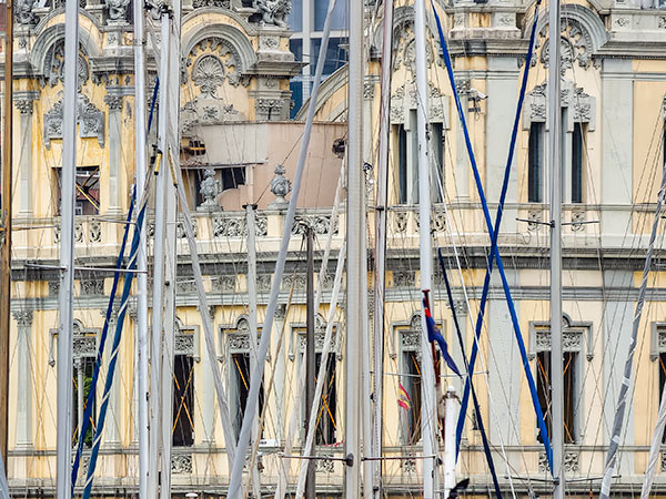 Masts of many sailboats in Barcelona harbor