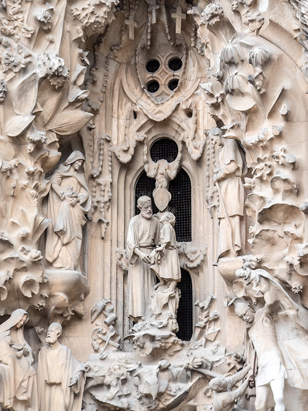 Barcelona Sagrada ornate exterior with statues and other figures